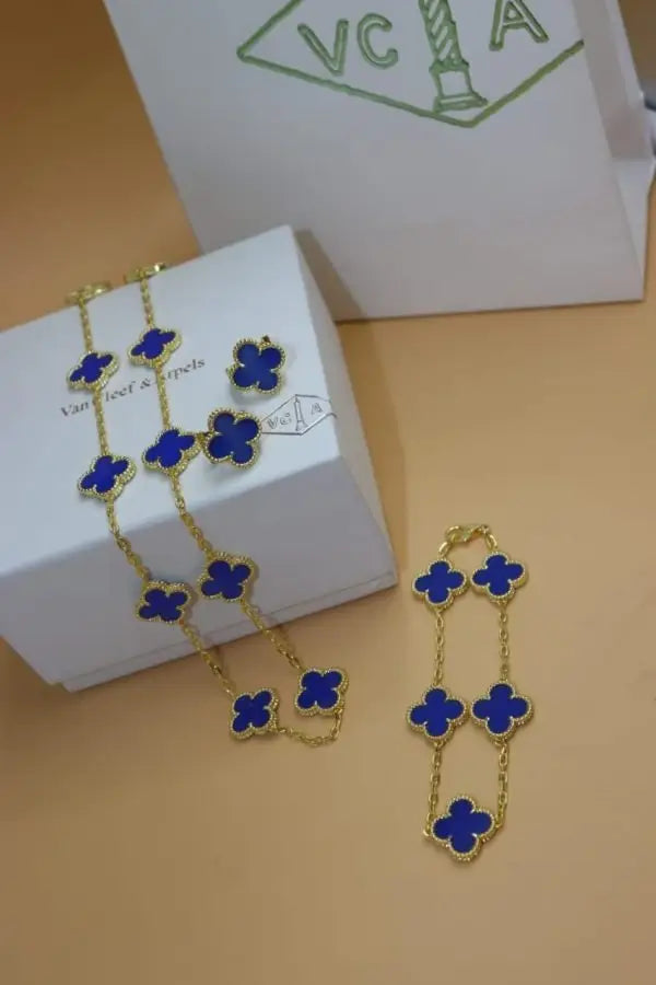 Van Cleef & Arpels Jewelry | Red Clover Diamond Necklace and Bracelet Set