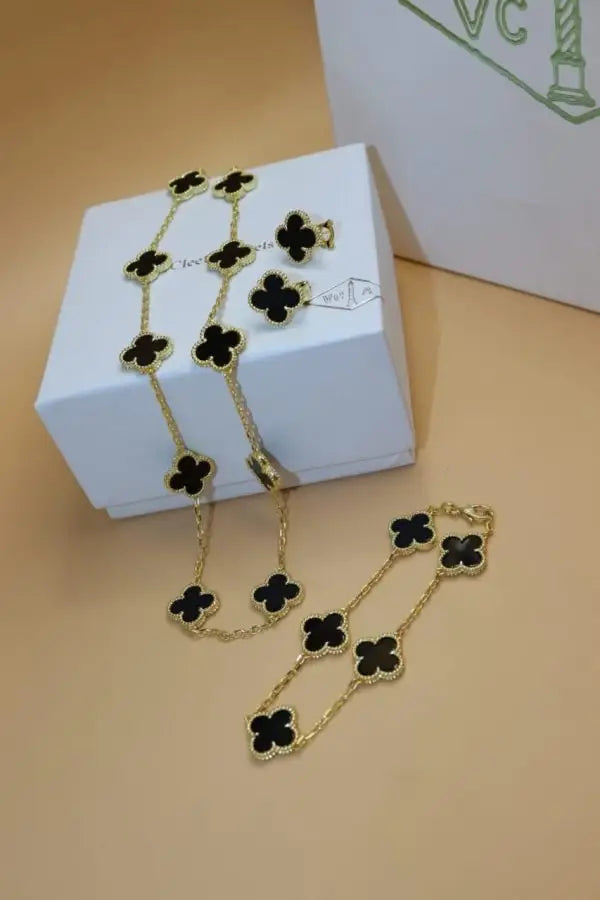 Van Cleef & Arpels Jewelry | Red Clover Diamond Necklace and Bracelet Set