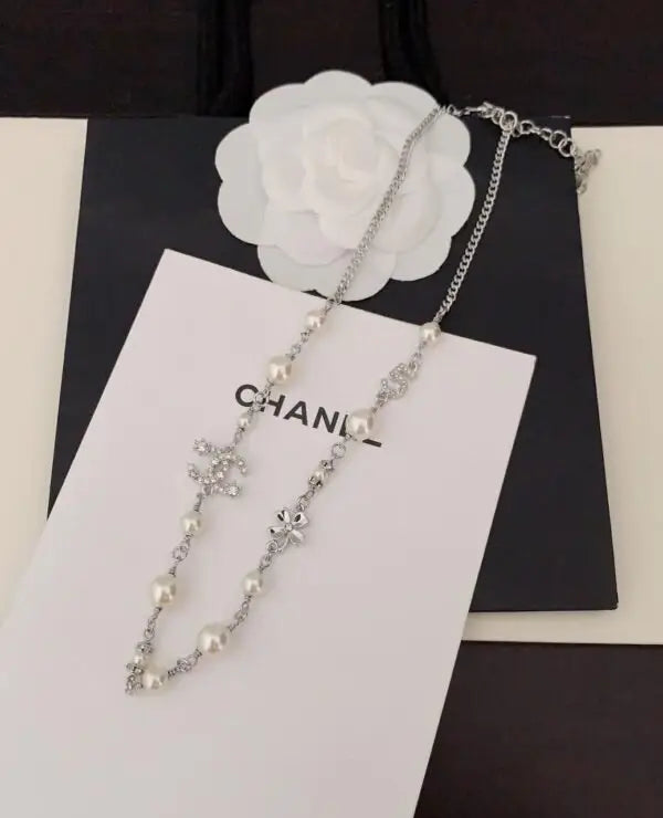 Chanel Jewelry | Pearl Strand with Integrated Crystal-Encrusted Logo