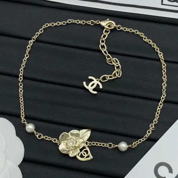 Chanel Jewelry | Camélia CC Logo Pearl Collection