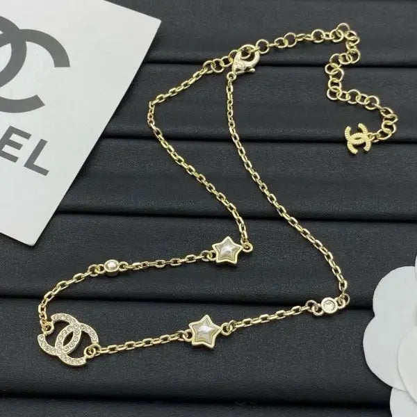 Chanel Jewelry | Camélia CC Logo Pearl Collection