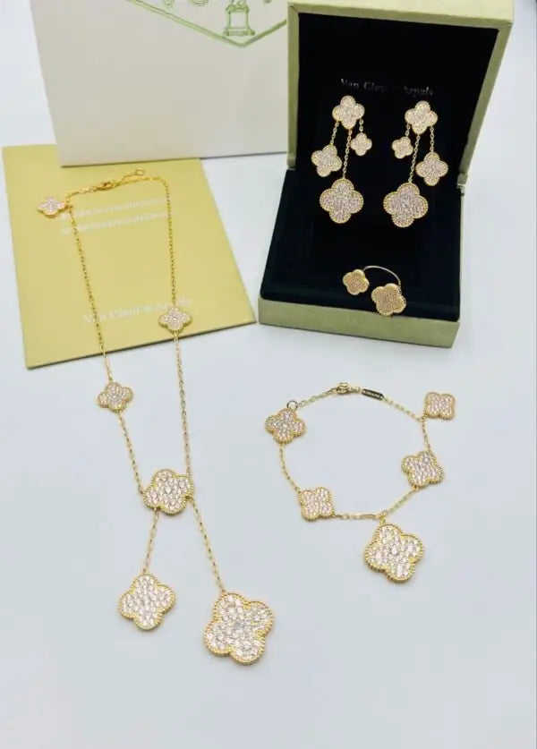 Van Cleef & Arpels Jewelry | Diamond Clover Necklace Earrings Bracelet Ring Set