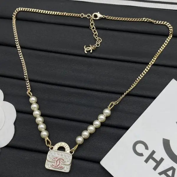 Chanel Jewelry | Camélia CC Logo Pearl Collection