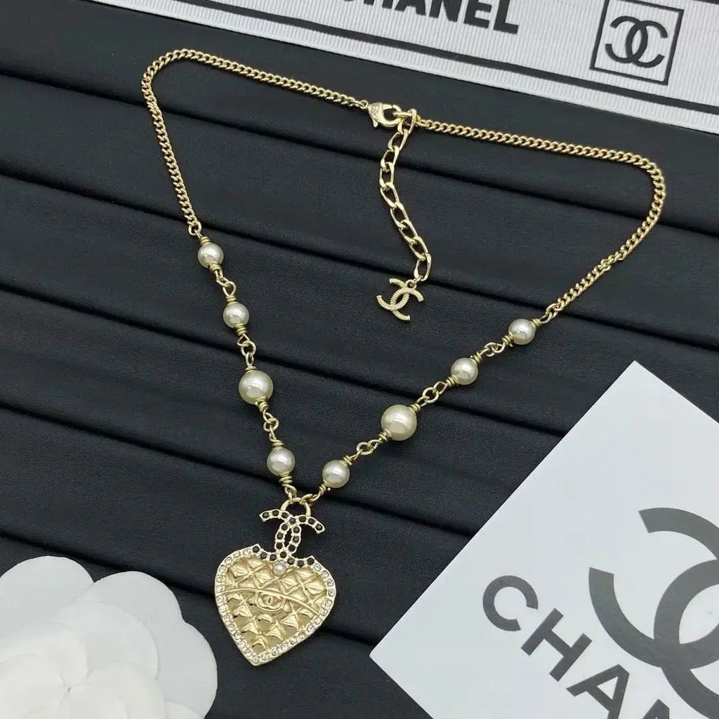 Chanel Jewelry | Quilted Heart CC Logo Pearl Station Necklace