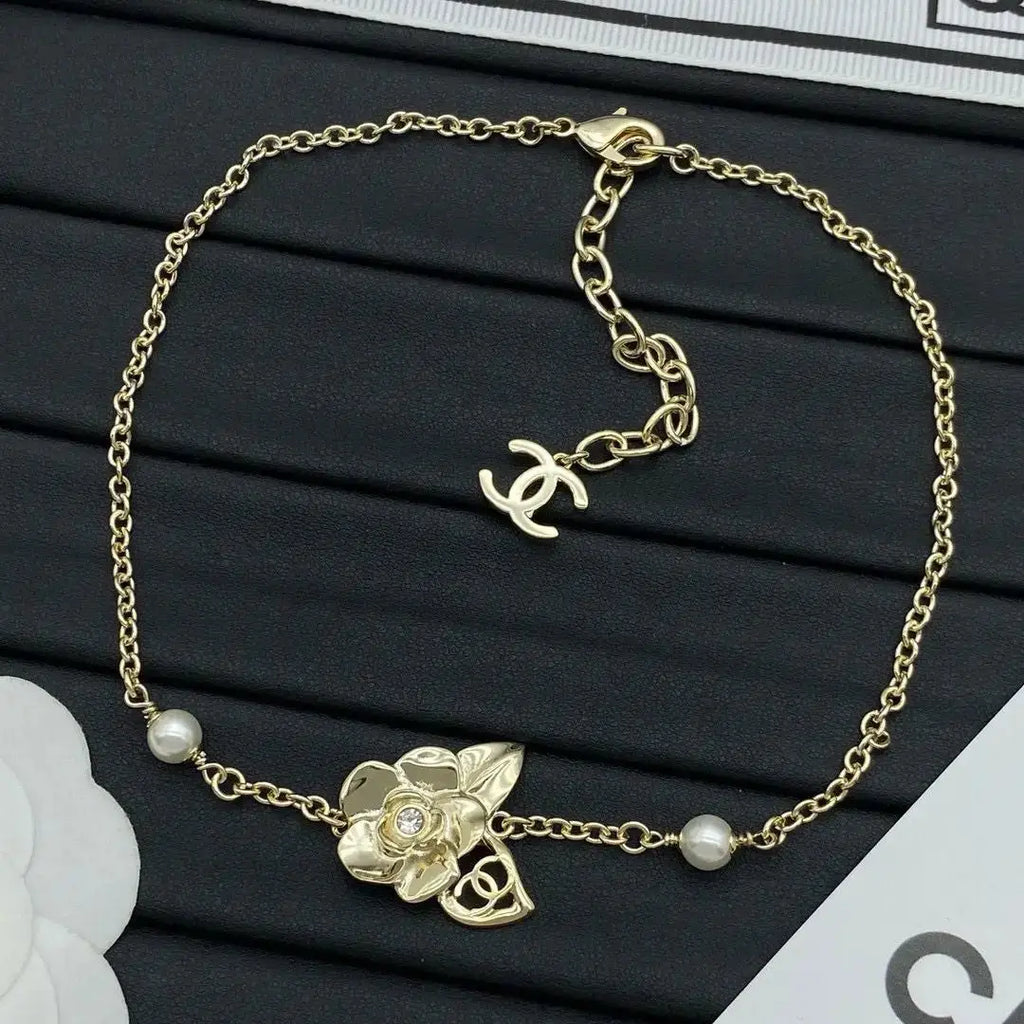 Chanel Jewelry | Camélia CC Logo Pearl Collection