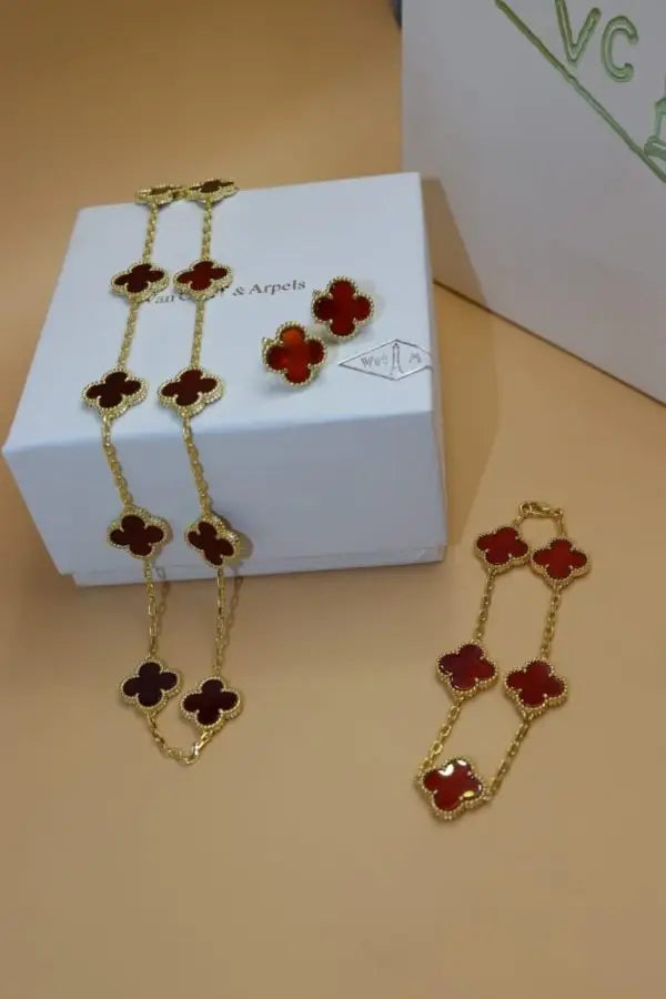 Van Cleef & Arpels Jewelry | Red Clover Diamond Necklace and Bracelet Set